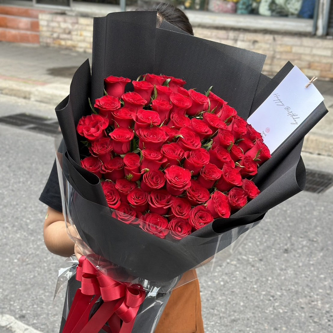 "Hugs and Kisses" Bouquet Of 50 Red Roses (Black)